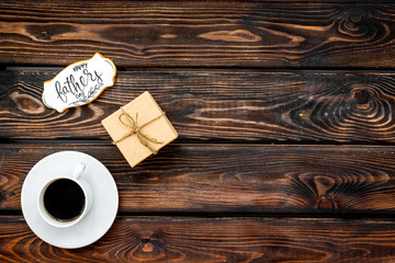 Happy Father Day with gift and coffee on wooden background top view mockup