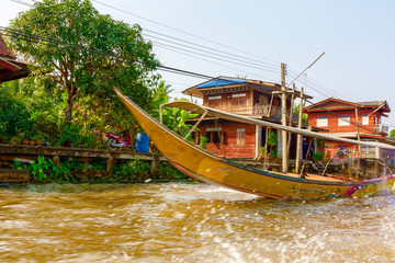 Fototapeta na wymiar Tourist boat sailing on the River Kwai. Thailand.