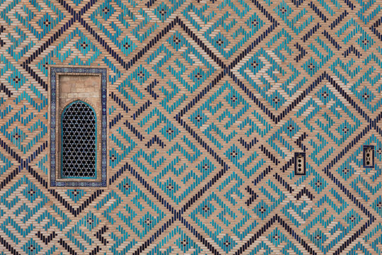 ancient wall of a mosque of mosaic tiles