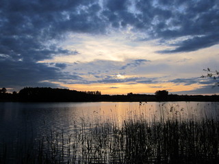 Beautiful sunset at the lake. Poland, Masuria - the land of a thousand lakes.
