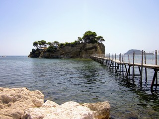 View of Cameo Island at Zakynthos, Greece, Europe. Beautiful small island connected with Agios Sostis with wooden bridge. Lovers island, popular wedding place at Zante.