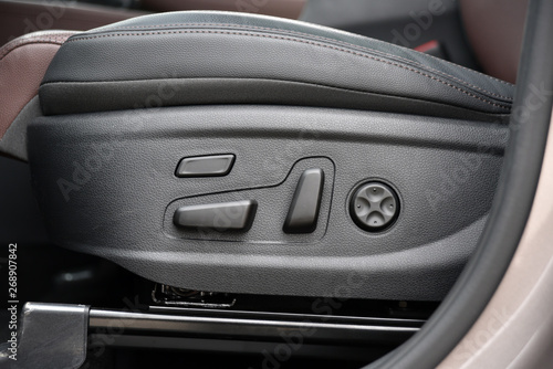 Buttons for adjusting seat position