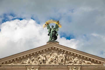 Sculpture of fame with palm branch on Lviv opera house, Ukraine