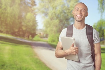 Young man student with book