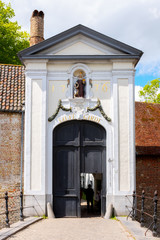 Entrance to Begijnhof (Beguinage), Order of Beguinageconvent, Bruges, Belgium, Europe