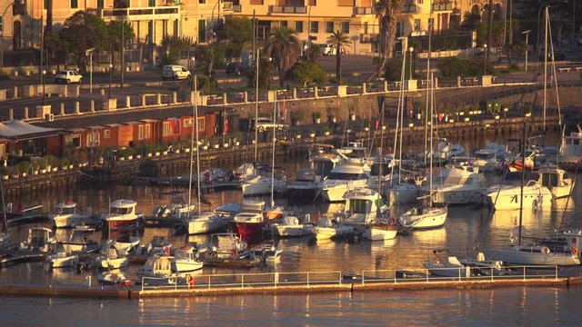 MESSINA, ITALY - NOVEMBER 06, 2018 - Panoramic view of the buildings on the side of the port in Sicily in 4k