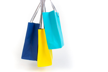 Paper shopping bags with handles on white background. Mockup for design.
