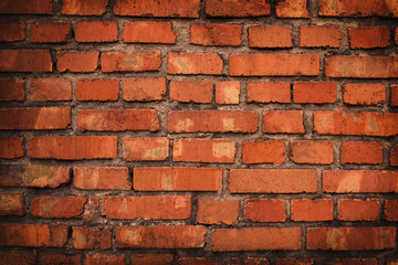 Old grunge red brick wall background. Interior design