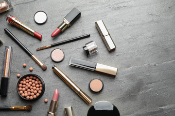 Fototapeta na wymiar Set of luxury makeup products on grey background, flat lay