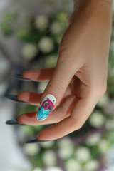 Stylish trendy female manicure. Beautiful Nail Art Manicure. Nail designs with decoration