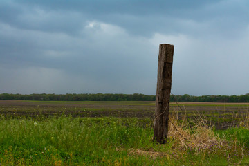 Post with rain clouds