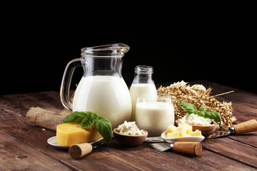 milk products - tasty healthy dairy products and milk jar and cheese