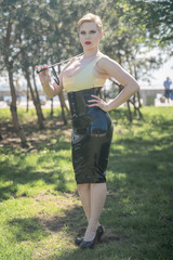 hot curvy woman with short hair and big boobs wearing latex kinky secretary dress with feitsh...