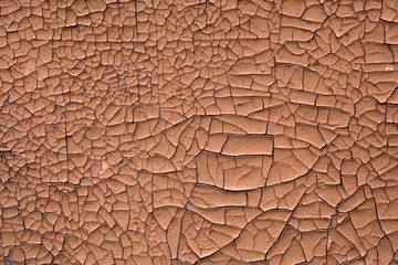 Background in the form of cracked from time paint brown