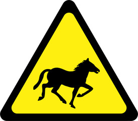 Warning sign with horses on road