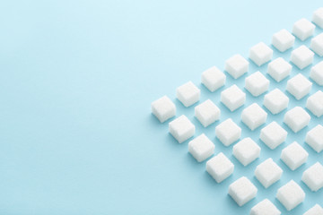 Sugar cubes pattern on blue copy space Geometry abstract background minimal style