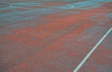 Artificial sports field with white lines markings close-up.