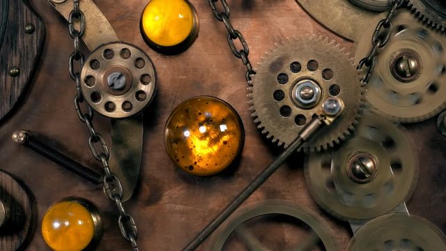 Steampunk, a time machine with rotating gears, a chain, blinking lights, springs. Very similar to a clock mechanism or a working device in the old style.