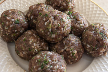 Meat meatballs on a plate. Meat meatballs on a white plate. Meat balls on a white background