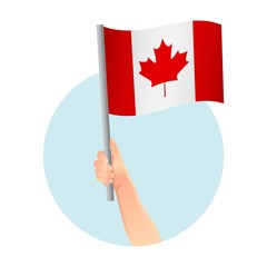 Fototapeta na wymiar Canada flag in hand icon