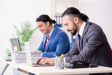 Two male colleagues in the office 