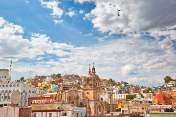 Fototapeta premium Panoramic view of Guanajuato historic center with typical colorful architecture and cobblestone narrow streets