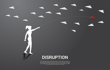 silhouette of businesswoman throw out red origami paper airplane opposite with others white. Business Concept of disruption and entrepreneur