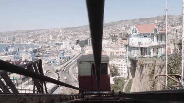 Detail of the operating cable in a funicular car counterbalanced. Panoramic view of Valparaiso, Chile. 4k