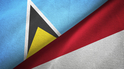Saint Lucia and Indonesia two flags textile cloth, fabric texture