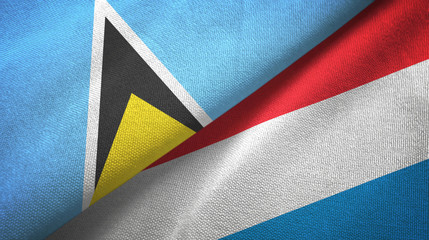 Saint Lucia and Luxembourg two flags textile cloth, fabric texture