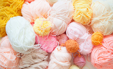 Yarn warm shades.. View from above. Rainbow colors. All colors. Yarn for knitting. Skeins of yarn.