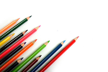 Multi color pencils are isolated on white background