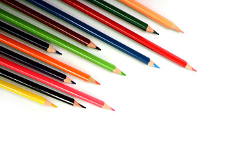 Multi color pencils are isolated on white background