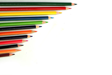 Multi color pencils are isolated on white background