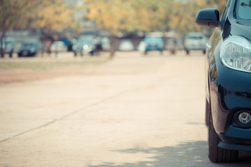 Half front view of black car park on the car park