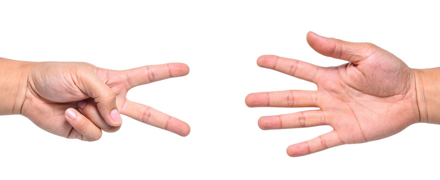 Close up hand man play Rock Paper Scissors isolated on white background
