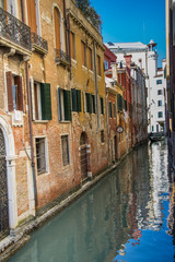 Obraz na płótnie Canvas Narrow canals are famous and typical in Venice,Italy, 2019