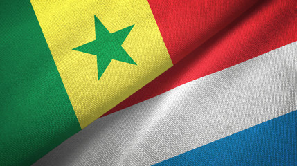 Senegal and Luxembourg two flags textile cloth, fabric texture