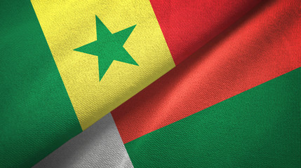 Senegal and Madagascar two flags textile cloth, fabric texture