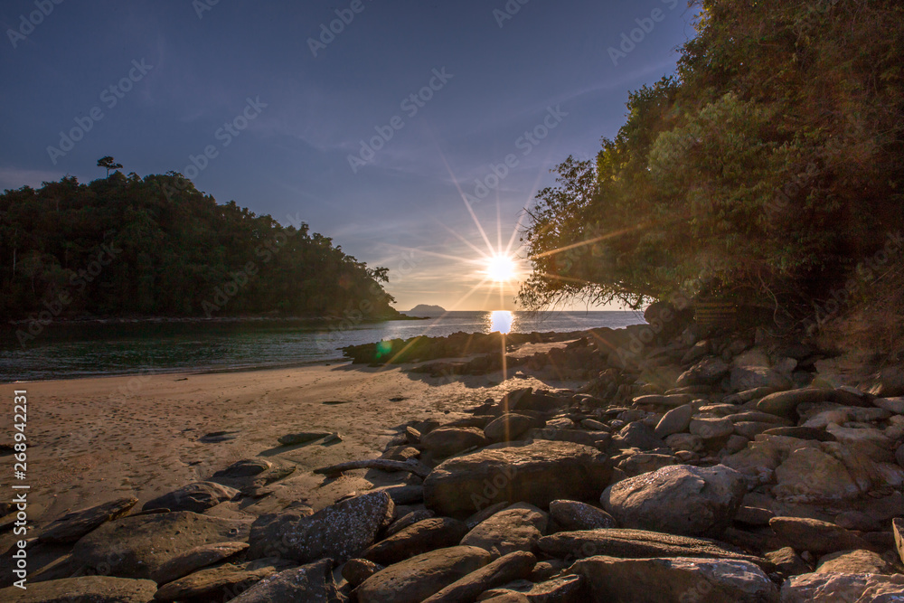 Wall mural natural close-up wallpaper of a seaside atmosphere, with a secret light, a beautiful twilight sky, w