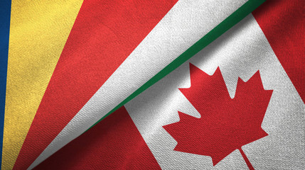Fototapeta na wymiar Seychelles and Canada two flags textile cloth, fabric texture 