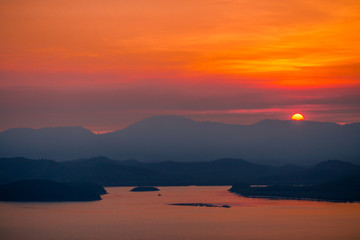 The natural background of the beautiful twilight sky, the surrounding atmosphere (trees, rivers, mountains) is a beautiful view of the journey, the view point. 