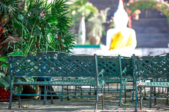 The background of the seat chair resting at the Wat Thep Phithak Punnaram, which has pagodas and statues for people to make merit and can take pictures in public in Pak Chong District, Thailand