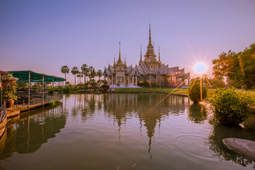 Wallpaper Wat Lan Boon Mahawihan Somdet Phra Buddhacharn(Wat Non Kum)is the beauty of the church that reflects the surface of the water, popular tourists come to make merit and take a public photo 