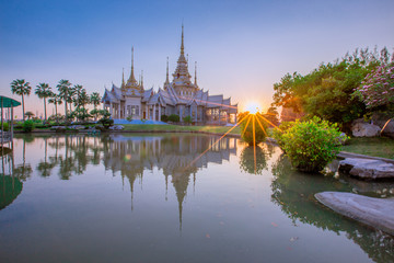 Wallpaper Wat Lan Boon Mahawihan Somdet Phra Buddhacharn(Wat Non Kum)is the beauty of the church that reflects the surface of the water, popular tourists come to make merit and take a public photo 