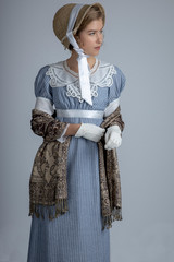Regency woman in blue dress