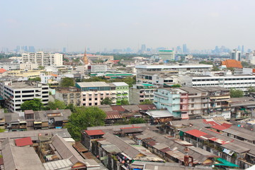 Bangkok Province, Thailand - February 3, 2019: Aerial view of Bangkok modern office buildings and temple. Take a picture from Wat Sraket Rajavaravihara (Golden Mount).