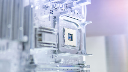 Close up of silver computer mainboard or metallic electronic circuit board. Use for background or backdrop in futuristic hardware technology concept