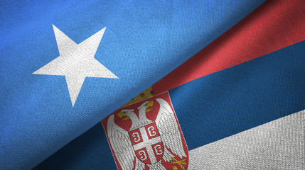 Somalia and Serbia two flags textile cloth, fabric texture