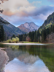View of Mount Skuta. Plansar Lake or Plansarsko jezero on valley Zgornje Jezersko in northern Slovenia